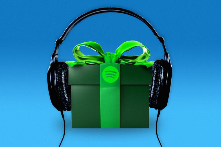 Photo illustration of a green gift box showcasing the Spotify logo
