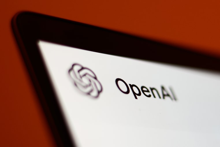 OpenAI ChatGPT website displayed on a laptop screen