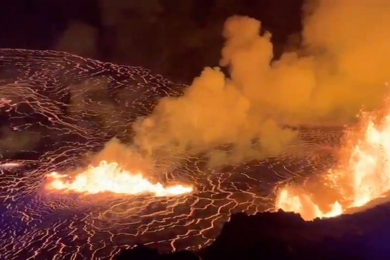 This image from video provided by the U.S. Geological Survey shows a lava lake erupting on the west caldera wall of the Kīlauea volcano in Hawaii, on Monday, Dec. 23, 2024.