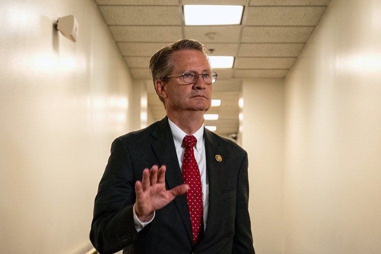 Rep. Tim Burchett, R-Tenn., waves to a reporter