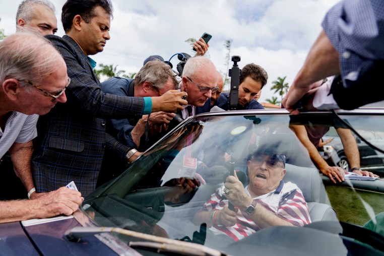 Rudy Giuliani speaks to members of the media outside a polling location in Palm Beach, Fla., on Nov. 5, 2024.