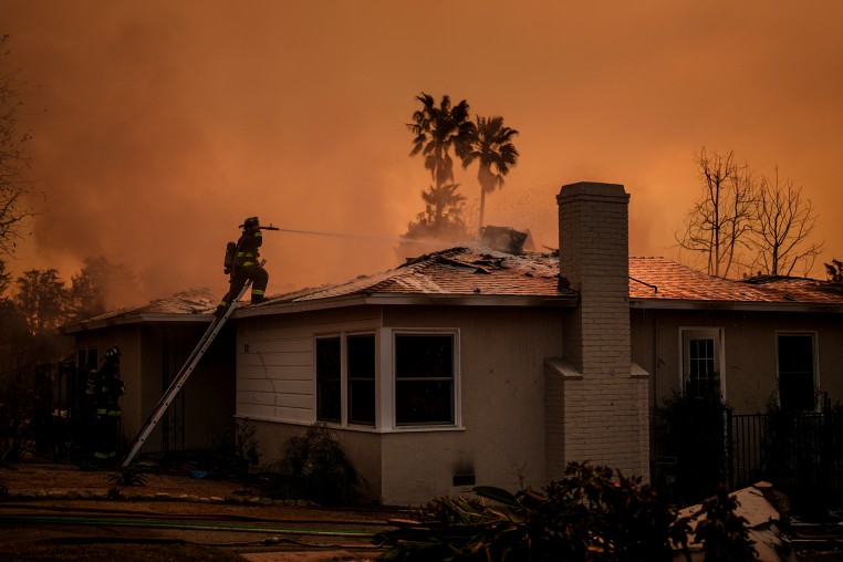 Fire crews battle the Eaton Fire