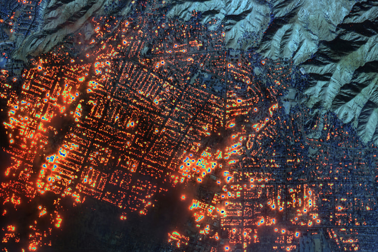 Maxar shortwave infrared closer satellite image of burning buildings in Altadena, California. 