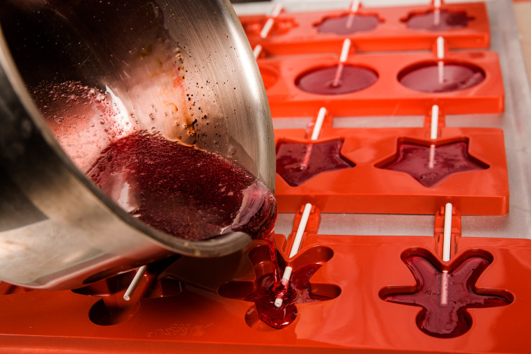 Sweets production of fruits loly pop at the factory