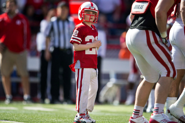 Jack Hoffman takes the field with the Nebraska football team