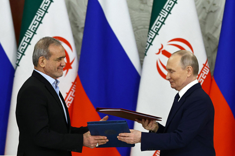 Russian President Vladimir Putin and Iranian President Masoud Pezeshkian sign a strategic partnership treaty 