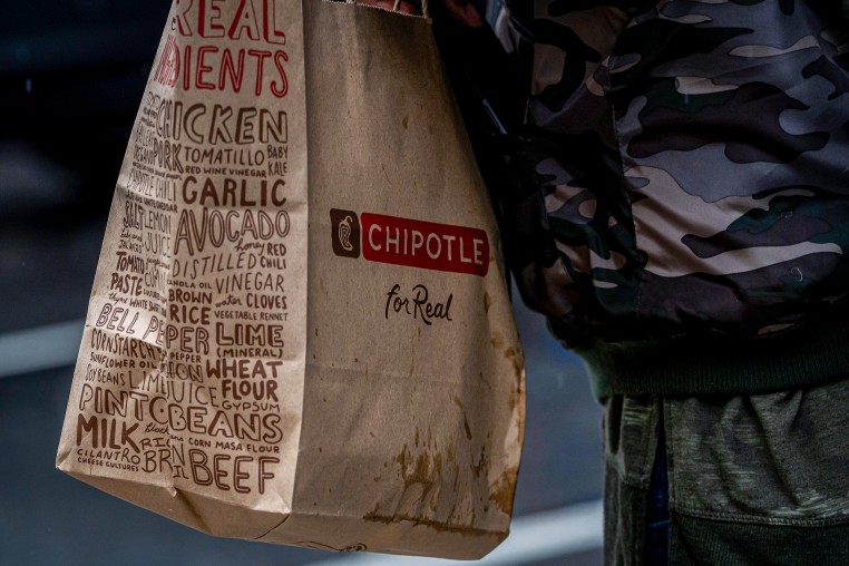 A to-go bag from Chipotle.