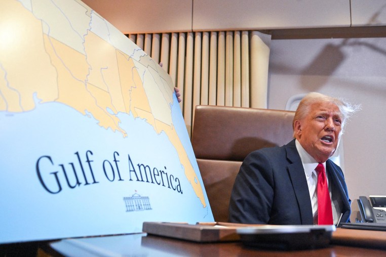 President Donald Trump next to a map showing the Gulf of America         