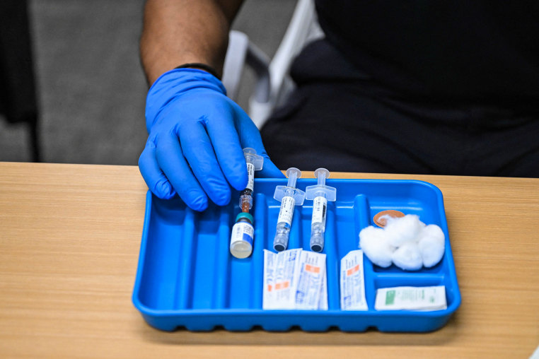 A health worker prepares a dose of the measles vaccine at a health center in Lubbock, Texas, on Feb. 27, 2025.