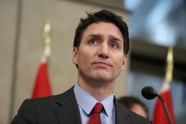 FILE PHOTO: Canada's PM Trudeau responds after U.S. President Trump ordered tariffs on Canadian imports, in Ottawa