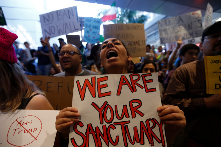 People protest President Donald Trump's travel ban at the Tom Bradley International Terminal at LAX on January 29, 2017 in Los Angeles, California. 