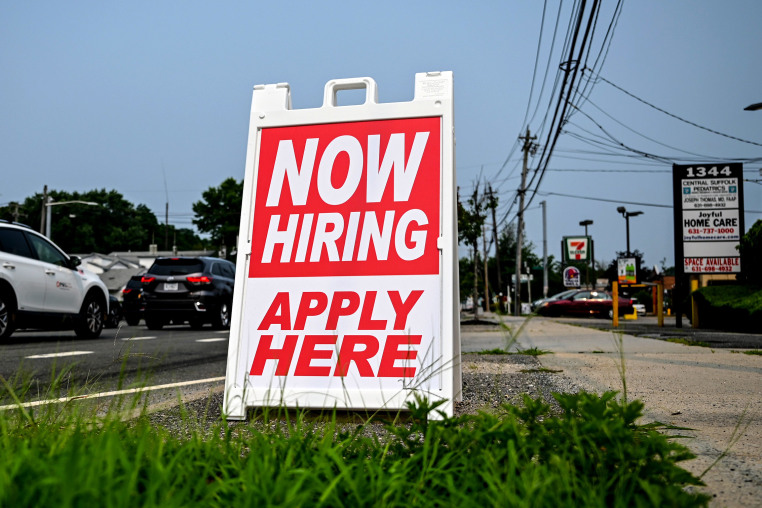 A now hiring sign in Long Island in July 2021.