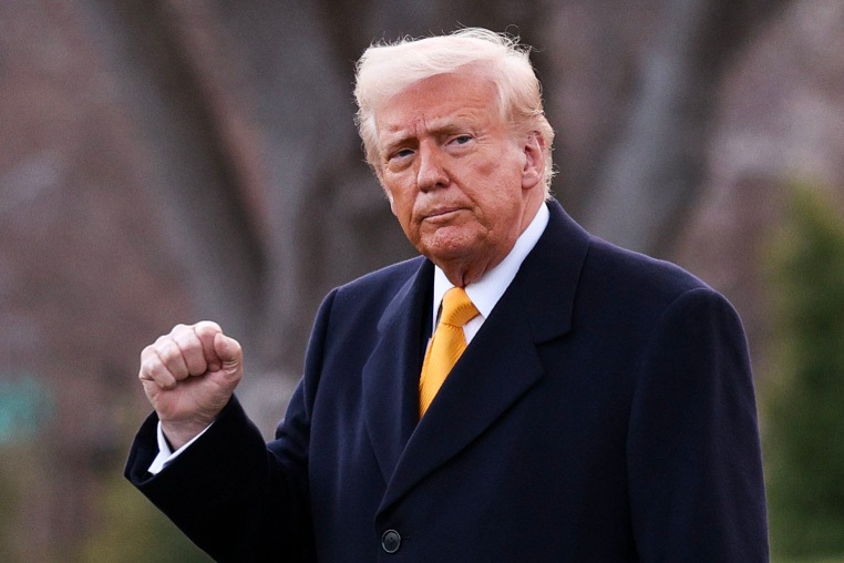 President Donald Trump walks across the South Lawn to board Marine One at the White House on March 7, 2025.