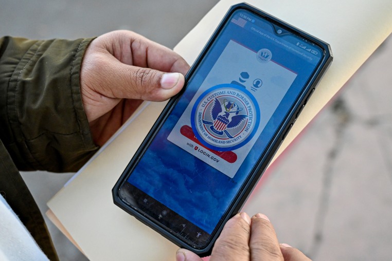 A person holds a phone.