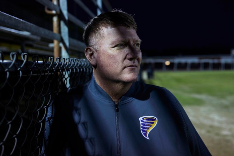 Tim Story poses for a portrait at the football field where he helped coach in Hattiesburg, Mississippi on March 7, 2025.