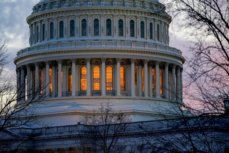 Light shines from the U.S. Capitol dome on Capitol Hill