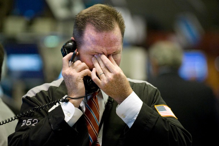 A trader works on the floor of the New York Stock Exchange on Sept. 17, 2008.