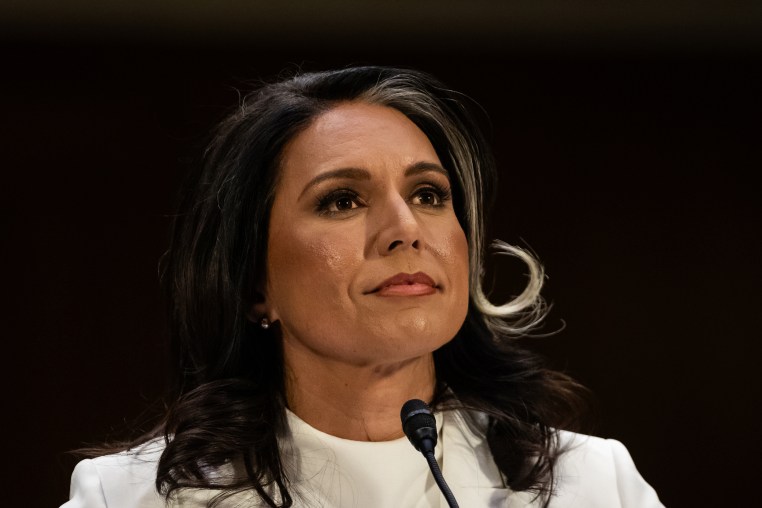 Tulsi Gabbard listens during a hearing