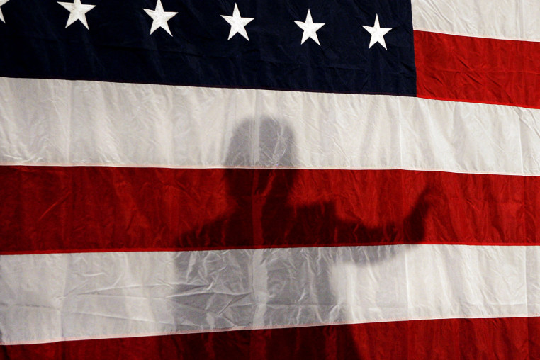 Shadow of a political candidate on a flag