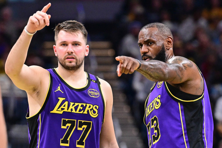 Luka Doncic and LeBron James during a Los Angeles Lakers v Indiana Pacers basketball game.