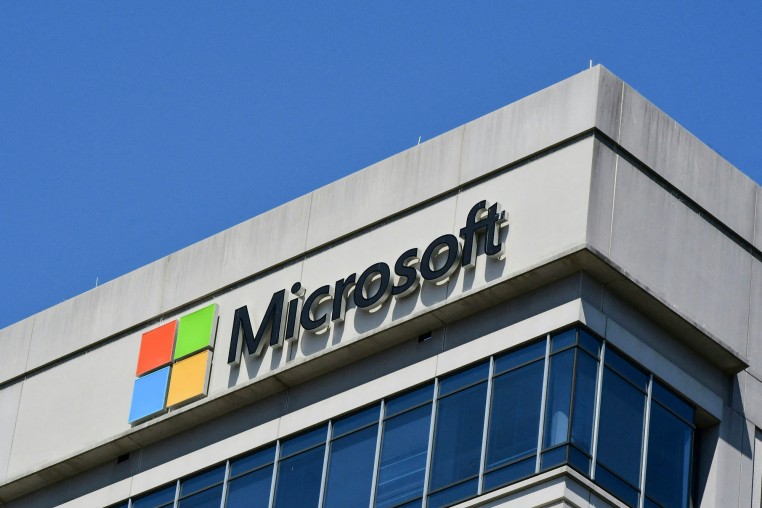 A Microsoft logo at the top of a building