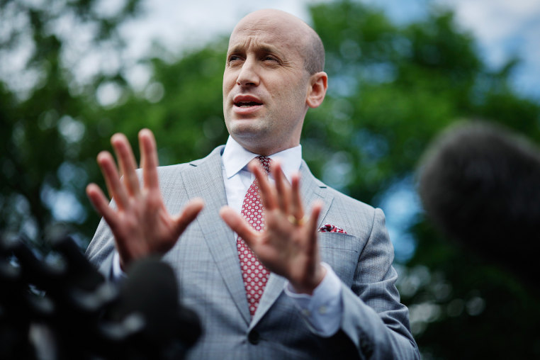 Stephen Miller speaks with reporters.