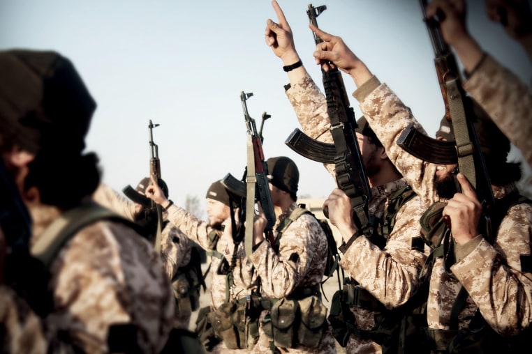 Nov. 19, 2015 - Raqqa, Syria - Islamic State of Iraq and the Levant propaganda photo showing masked militants in Syria. (Credit Image: © Dabiq/Planet Pix via ZUMA Wire)