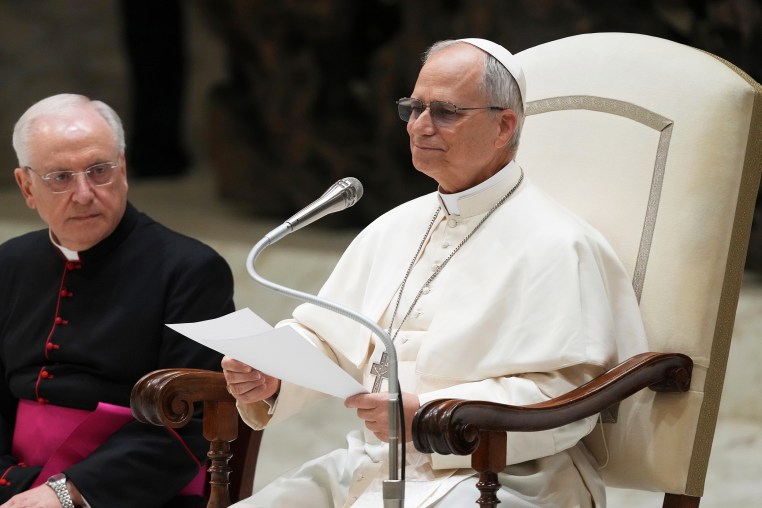Pope Leo XIV  speaks to reporters.