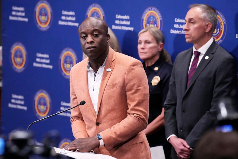 Yemi Mobolade considers a question during a news conference 