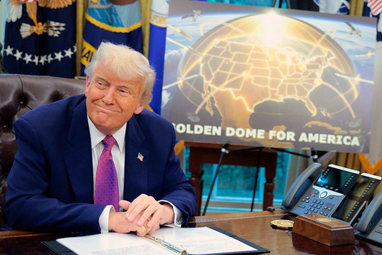 President Donald Trump and Defense Secretary Pete Hegseth in the Oval Office as they announce plans for a "Golden Dome" on May 20, 2025.