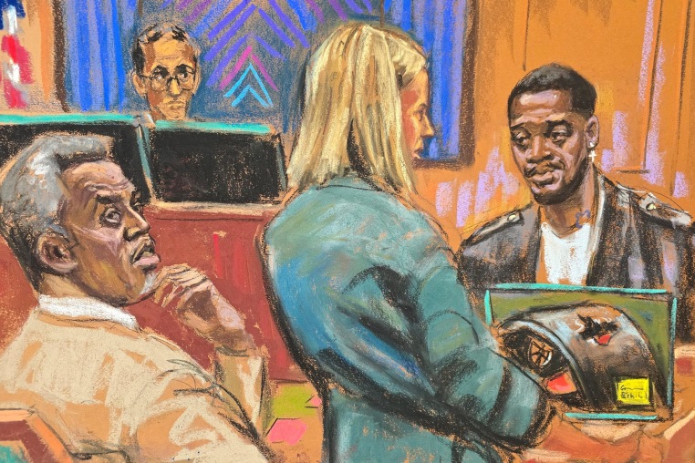 Prosecutor Emily Johnson questions rapper Kid Cudi as he testifies at Sean "Diddy" Combs' sex trafficking trial in New York City, New York, U.S., May 22, 2025.