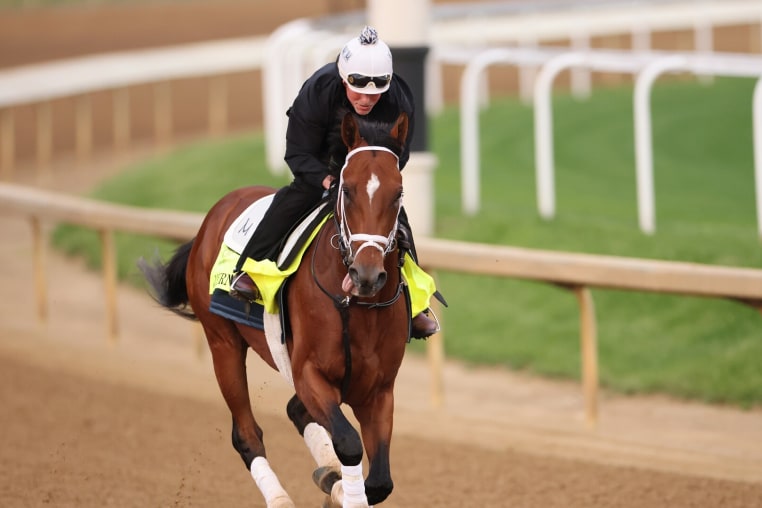 LOUISVILLE, KENTUCKY - MAY 01: Journalism trains on the track prior to the running of the 151st Kentucky Derby at Churchill Downs on May 01, 2025 in Louisville, Kentucky. (Photo by Michael Reaves/Getty Images)
