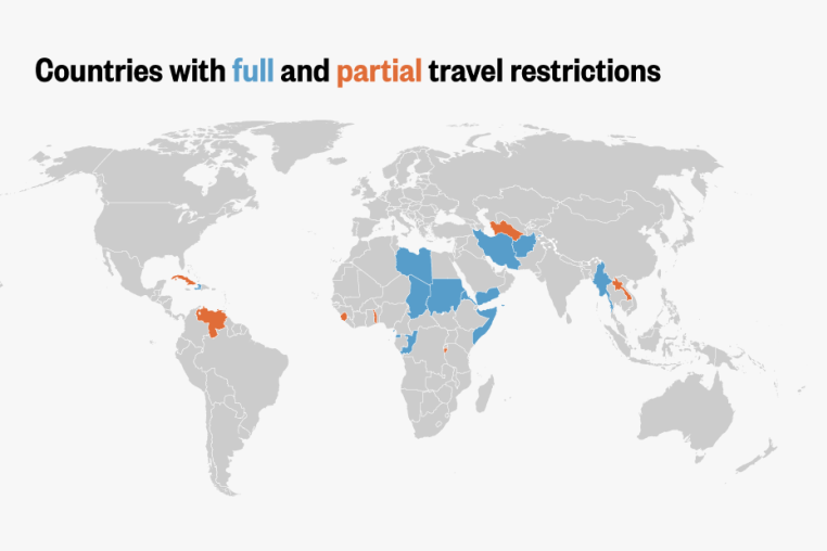 A world map showing countries with travel restrictions. Countries with full travel restrictions are shaded in blue, while those with partial restrictions are in orange. Blue-shaded countries include Afghanistan, Myanmar, Chad, Republic of Congo, Equatorial Guinea, Eritrea, Haiti, Iran, Libya, Somalia, Sudan and Yemen. Orange-shaded countries include Burundi, Cuba, Laos, Sierra Leone, Togo, Turkmenistan and Venezuela. The rest of the world is shaded in gray, indicating no significant travel restrictions.