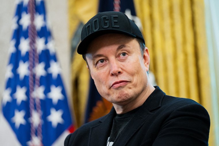 Elon Musk looks on during a news conference with President Donald Trump in the Oval Office on May 30, 2025.