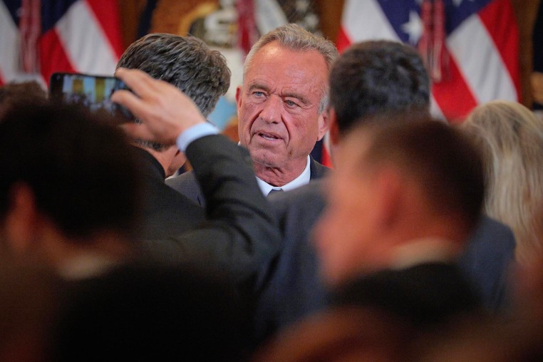 Health and Human Services Secretary Robert F. Kennedy Jr. talks to guests following an event to release the new Make America Healthy Again Commission report at the White House on May 22, 2025.