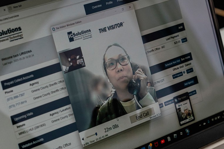 Ming Li Hui, known to people as Carol, speaks from jail by video link to Liradona Ramadani, whose family owns the restaurant where Carol worked, in Kennett, Mo., May 26, 2025. 