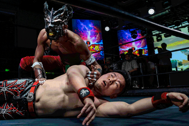Scenes during the Middle Kingdom Wrestling “Battle of the Decade” in Beijing on May 24.