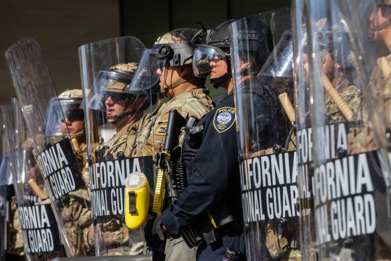 California National Guard members stand outside the Federal Building