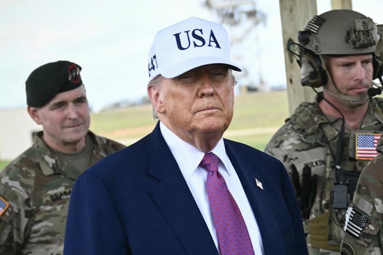 President Donald Trump watches a military demonstration at Fort Bragg in North Carolina on June 10, 2025. 