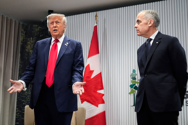 Donald Trump, left, and Mark Carney speak