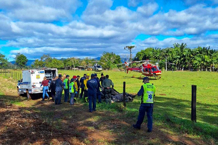 Emergency services operate at the area where a hot air balloon crashed.