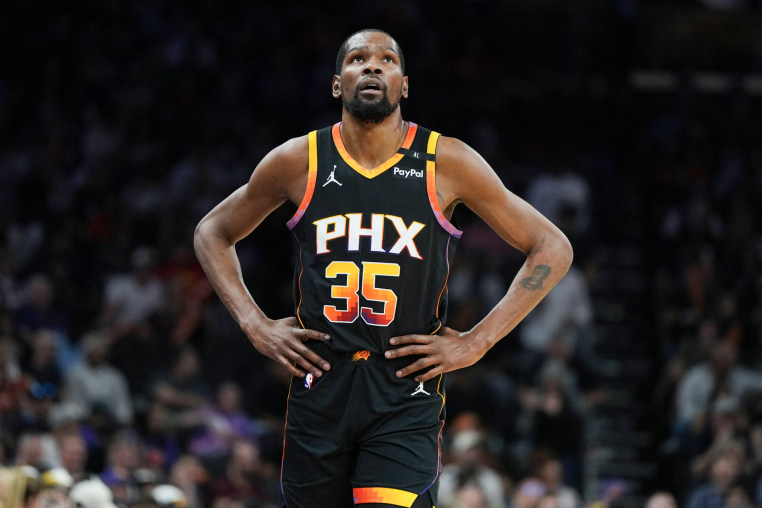 Kevin Durant stands on the basketball court