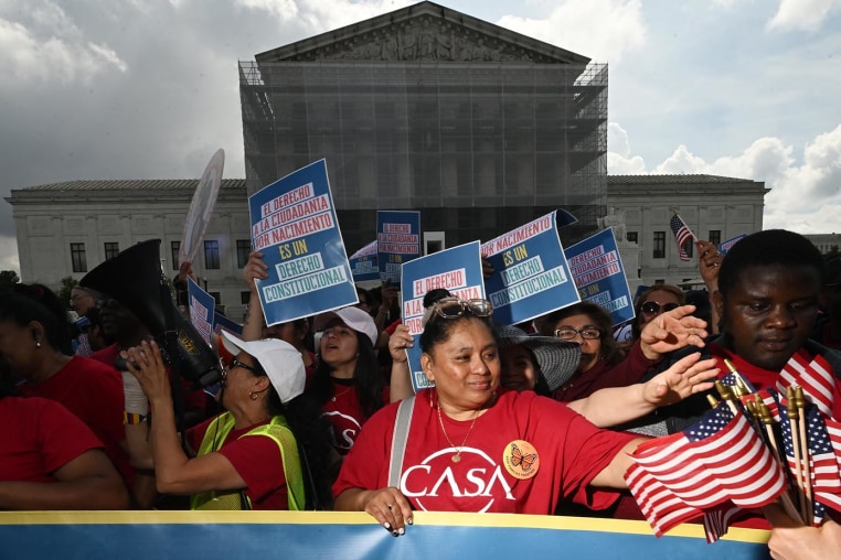 Demonstrators rally outside the Supreme Court in support of birthright citizenship 