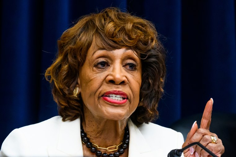 Maxine Waters points as she speaks. 