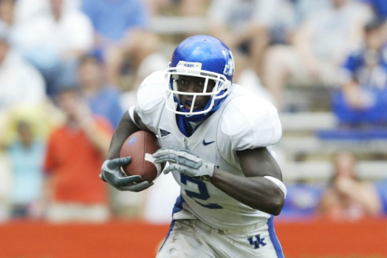 Kentucky Wildcats wide receiver  Scott Mitchell holds the ball during a game.