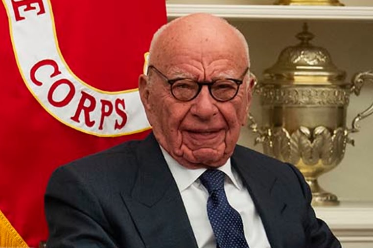 Media mogul Rupert Murdoch looks on as President Donald Trump speaks in the Oval Office on Feb. 3, 2025. 