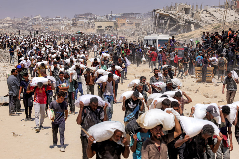 TOPSHOT-PALESTINIAN-ISRAEL-CONFLICT-GAZA-AID