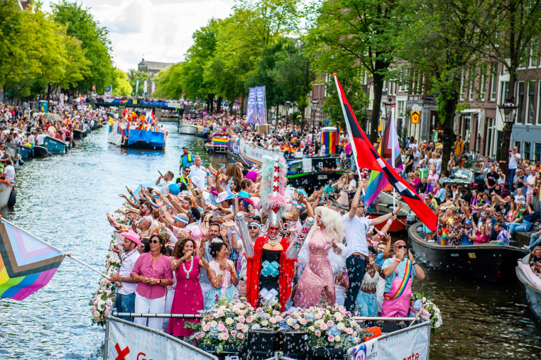 Boats on the Amstel river during Pride.
