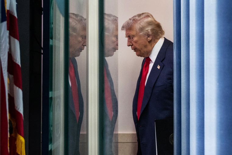 President Donald Trump arrives for a news conference 