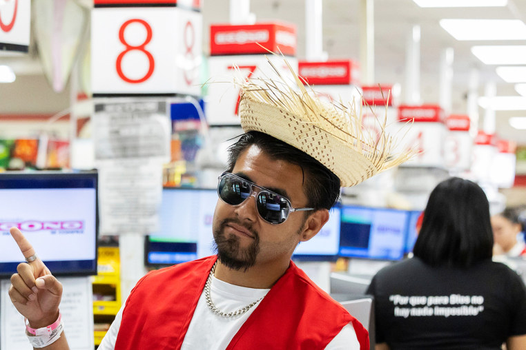 A visitor on a guided tour poses for a photo